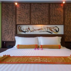 Отель The Bliss Suite Patong сейф в номере
