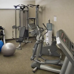 Отель Acclaim Hotel Calgary Airport Канада, Калгари - отзывы, цены и фото номеров - забронировать отель Acclaim Hotel Calgary Airport онлайн фитнесс-зал фото 2