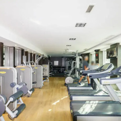 Отель Maison Privee - Burj Residence фитнесс-зал