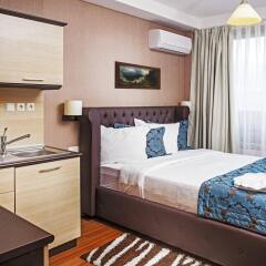 Regnum Apartment Hotel в номере фото 2
