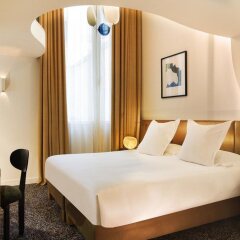 Hotel Marignan Champs-Elysées комната для гостей фото 4