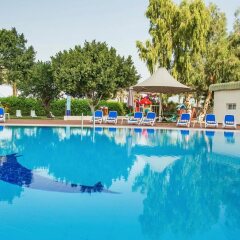 Отель Holiday International Sharjah ОАЭ, Шарджа - 5 отзывов об отеле, цены и фото номеров - забронировать отель Holiday International Sharjah онлайн бассейн фото 3