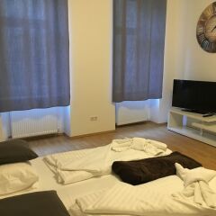 Отель United Homes Apartments Vienna Австрия, Вена - отзывы, цены и фото номеров - забронировать отель United Homes Apartments Vienna онлайн комната для гостей фото 2