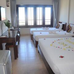 Sunshine Hotel Хойан комната для гостей фото 4