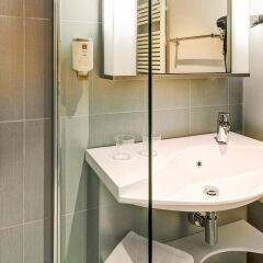 Отель Aparthotel Adagio Frankfurt City Messe ванная