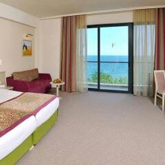 Отель Grifid Hotel Bolero & AquaPark Болгария, Золотые пески - отзывы, цены и фото номеров - забронировать отель Grifid Hotel Bolero & AquaPark онлайн комната для гостей фото 3