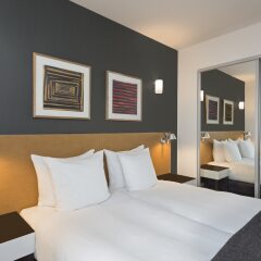 Отель Adina Apartment Hotel Copenhagen Дания, Копенгаген - 1 отзыв об отеле, цены и фото номеров - забронировать отель Adina Apartment Hotel Copenhagen онлайн комната для гостей фото 4