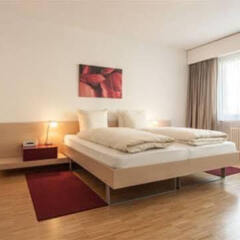 Апартаменты EMA house Serviced Apartments, Unterstrass Цюрих комната для гостей