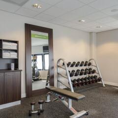 Отель Hampton by Hilton Amsterdam Airport Schiphol фитнесс-зал фото 2