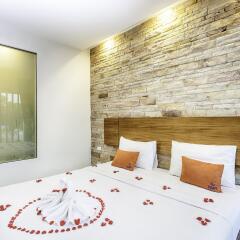 Escape De Phuket Hotel & Villa комната для гостей