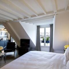 Отель Les Suites Parisiennes Франция, Париж - отзывы, цены и фото номеров - забронировать отель Les Suites Parisiennes онлайн комната для гостей фото 3