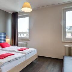 Отель MEININGER Hotel München City Center Германия, Мюнхен - 2 отзыва об отеле, цены и фото номеров - забронировать отель MEININGER Hotel München City Center онлайн комната для гостей фото 5