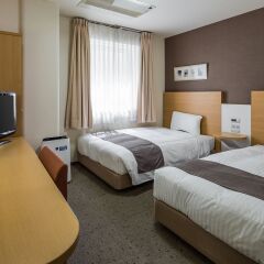Comfort Hotel Tendo комната для гостей