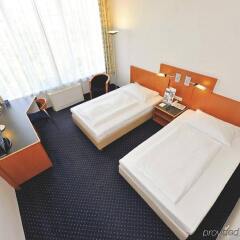 Отель Park Inn by Radisson Dresden комната для гостей фото 3