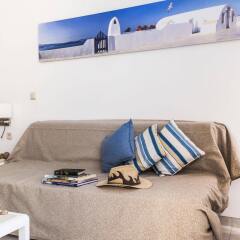 Апартаменты Ammades Epsilon Apartments комната для гостей фото 2