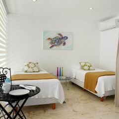 Отель Costa Fina Oceanview Penthouse Мексика, Плая-дель-Кармен - отзывы, цены и фото номеров - забронировать отель Costa Fina Oceanview Penthouse онлайн комната для гостей