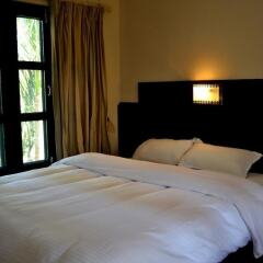Отель Rhino Lodge & Hotel Непал, Саураха - отзывы, цены и фото номеров - забронировать отель Rhino Lodge & Hotel онлайн комната для гостей фото 3