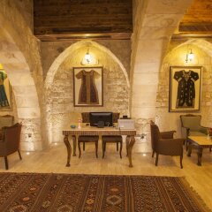 Kayakapi Premium Caves Cappadocia Турция, Ургуп - 1 отзыв об отеле, цены и фото номеров - забронировать отель Kayakapi Premium Caves Cappadocia онлайн интерьер отеля фото 2