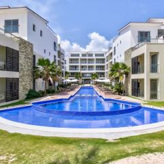 Отель Costa Atlantica Beach Condos Доминикана, Пунта Кана - отзывы, цены и фото номеров - забронировать отель Costa Atlantica Beach Condos онлайн бассейн фото 2