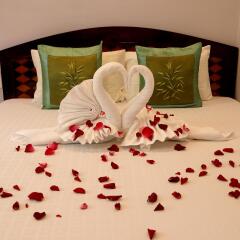 Отель Green Garden Homestay сейф в номере