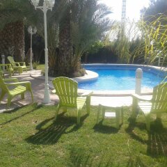 Отель Casa Los jardines de Lola