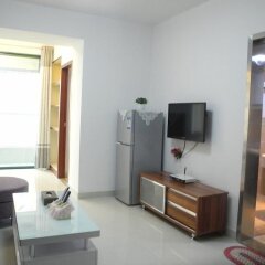Апартаменты Shenzhen Xin Phoenix Gang Ao 8 Apartment комната для гостей фото 5