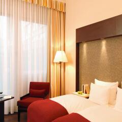 Отель NH Collection Berlin Mitte Friedrichstrasse 4* Стандартный номер с различными типами кроватей фото 2