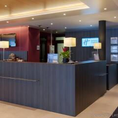 Отель Holiday Inn Express Zurich Airport Швейцария, Рюмланг - 1 отзыв об отеле, цены и фото номеров - забронировать отель Holiday Inn Express Zurich Airport онлайн интерьер отеля