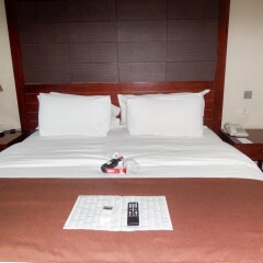 Апартаменты Park Inn By Radisson Serviced Apartments Лагос комната для гостей фото 5