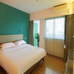 Отель 4th Zhongshan Road Garden Inn комната для гостей