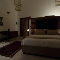 Отель Alvino Suite & Breakfast Лечче сейф в номере