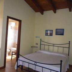 Отель Agriturismo Cuccuru Aiò Ористано комната для гостей