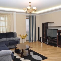 Гостиница Posutochno Apartments 1905 Goda в Москве отзывы, цены и фото номеров - забронировать гостиницу Posutochno Apartments 1905 Goda онлайн Москва комната для гостей