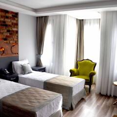 Мини-Отель Aplus Residence комната для гостей