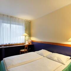 AZIMUT Hotel City South Berlin комната для гостей фото 2