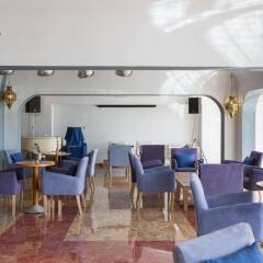 Апартаменты Oura View Beach Club Apartments интерьер отеля