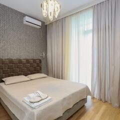Апартаменты Hosthub - 2BR Super view Apartment Тбилиси комната для гостей