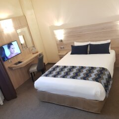 Hotel Champerret Elysees сейф в номере