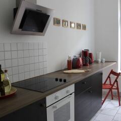 Апартаменты Leon Suite Apartments в номере