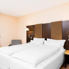 NH Geneva Airport Hotel комната для гостей фото 3