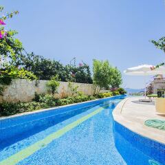Villa Alfia by Akdenizvillam Турция, Калкан - отзывы, цены и фото номеров - забронировать отель Villa Alfia by Akdenizvillam онлайн бассейн фото 3