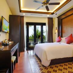 Отель KOI Resort and Spa Hoi An комната для гостей фото 5