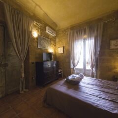 Отель Le stanze dello Scirocco Sicily Luxury Агридженто комната для гостей фото 3