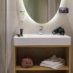 Отель Aparthotel Adagio access München City Olympiapark Германия, Мюнхен - 4 отзыва об отеле, цены и фото номеров - забронировать отель Aparthotel Adagio access München City Olympiapark онлайн ванная