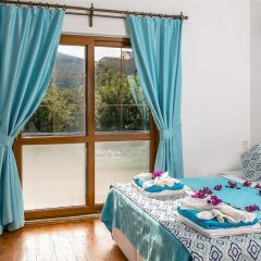 Villa Karsak by Akdenizvillam Турция, Калкан - отзывы, цены и фото номеров - забронировать отель Villa Karsak by Akdenizvillam онлайн комната для гостей фото 2