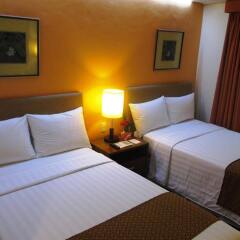 Отель Makati Crown Regency Hotel Филиппины, Макати - отзывы, цены и фото номеров - забронировать отель Makati Crown Regency Hotel онлайн комната для гостей фото 3