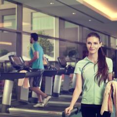 Отель Al Ghurair Rayhaan by Rotana фитнесс-зал фото 4