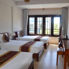 Sunshine Hotel Хойан комната для гостей фото 5