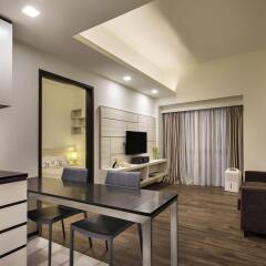 Апартаменты Orange Grove Service Apartment by ST Residences комната для гостей фото 3