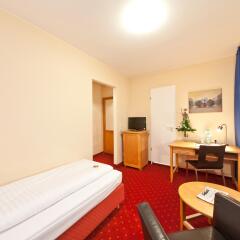 Novum Hotel Gates Berlin Charlottenburg комната для гостей